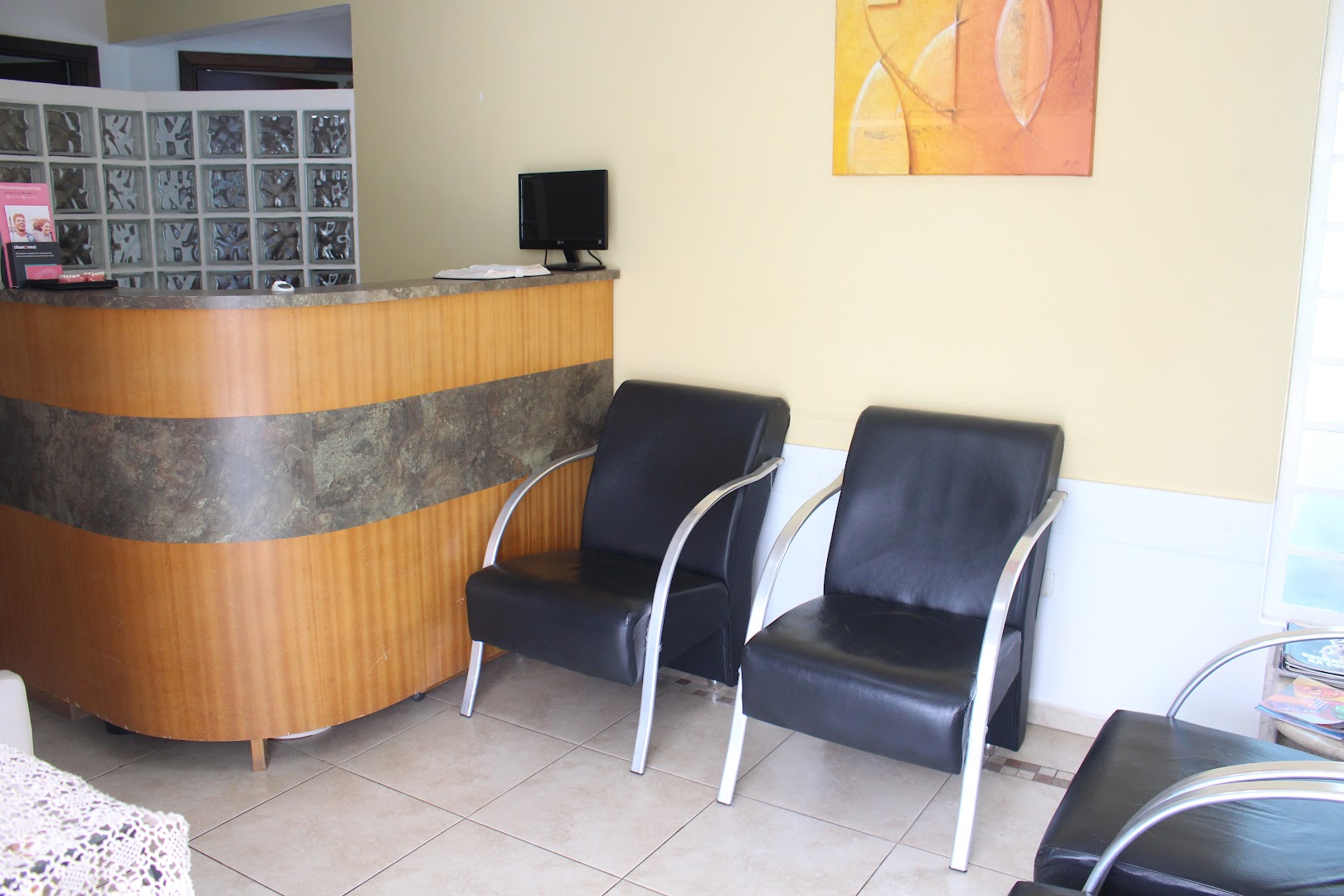 Sala de espera confortável — Odontologia Bom Retiro, Curitiba